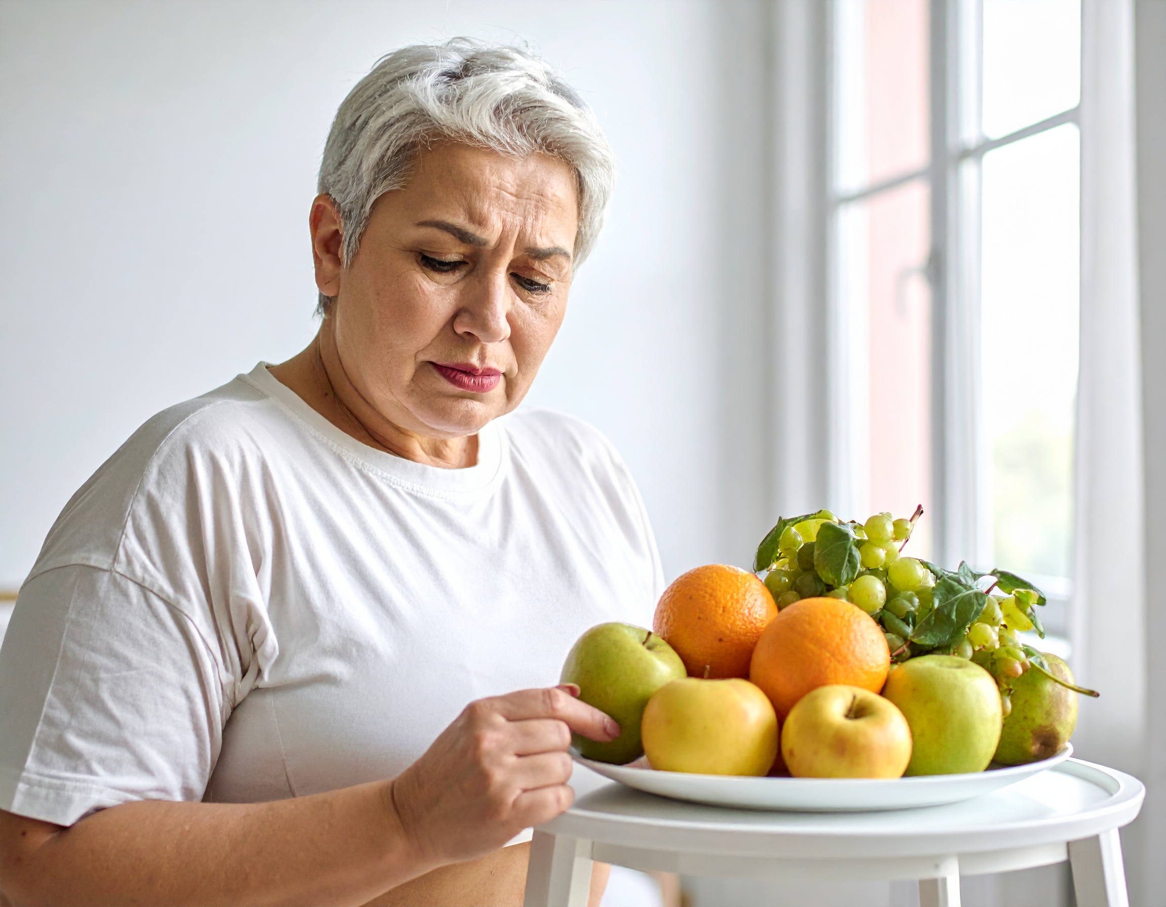 Frau mit Ausdruck: Abnehmen kann frustrierend sein.