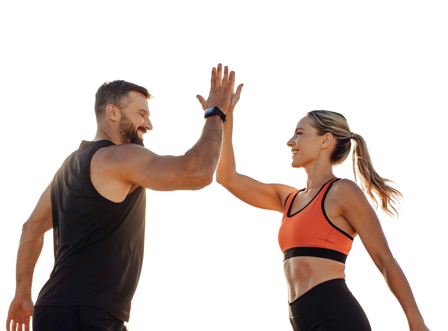 Eine Frau und ein Mann beim Training. Sie machen ein high-five und freuen sich über gemeinsamen Erfolg